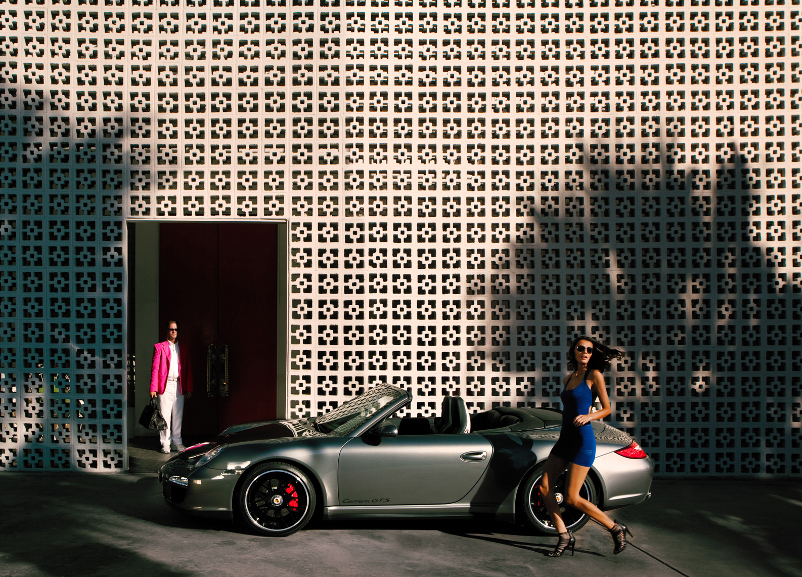 Fashion model Porsche 911 convertible by commercial automotive car photographer Michael Grecco