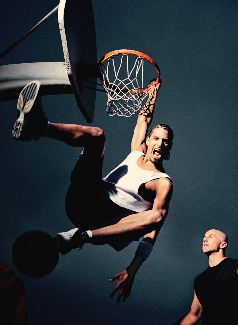 Basketballs players dunk by commercial sports photographer Michael Grecco